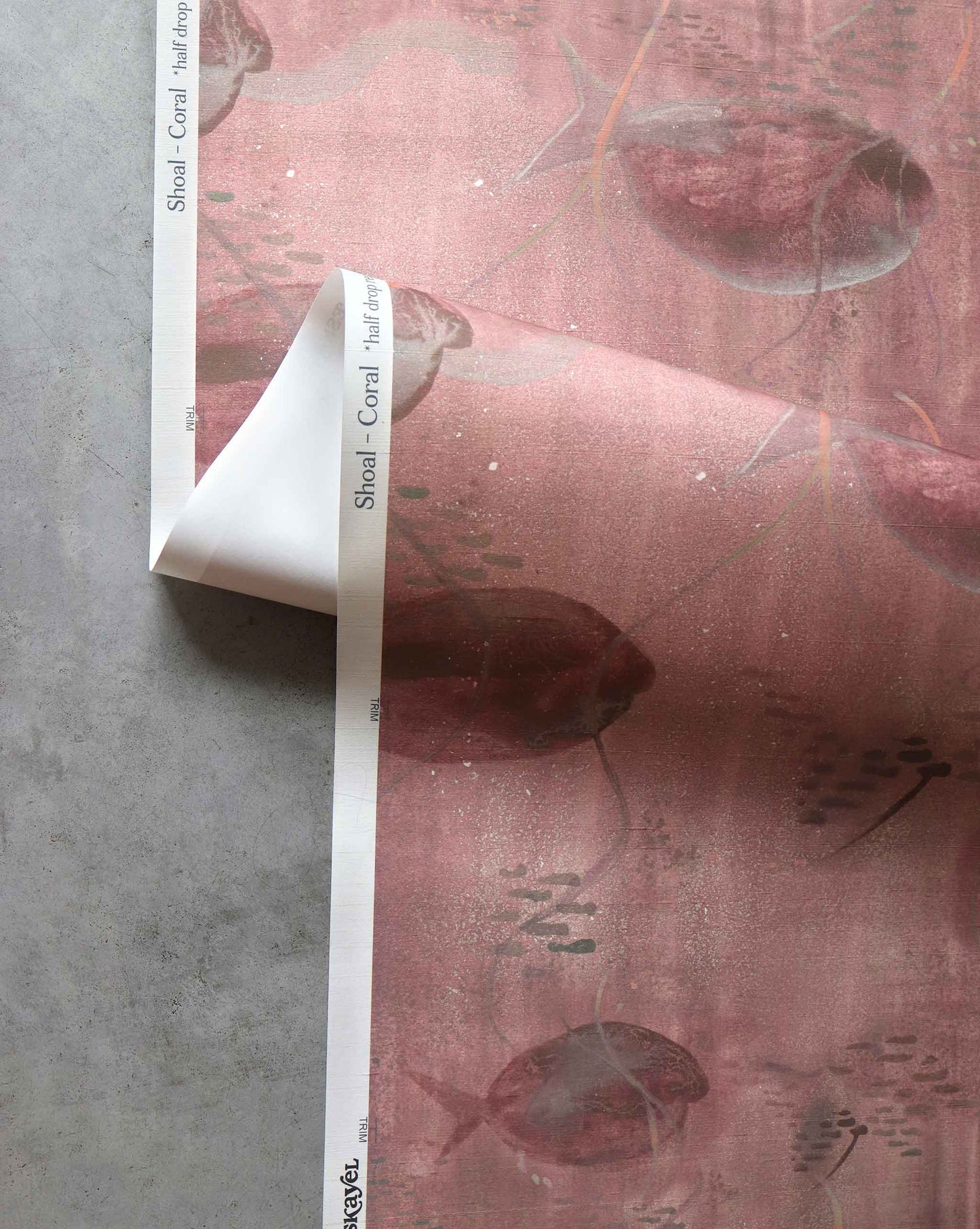 A detailed shot of Eskayel’s Shoal wallpaper in Coral with its red palette.