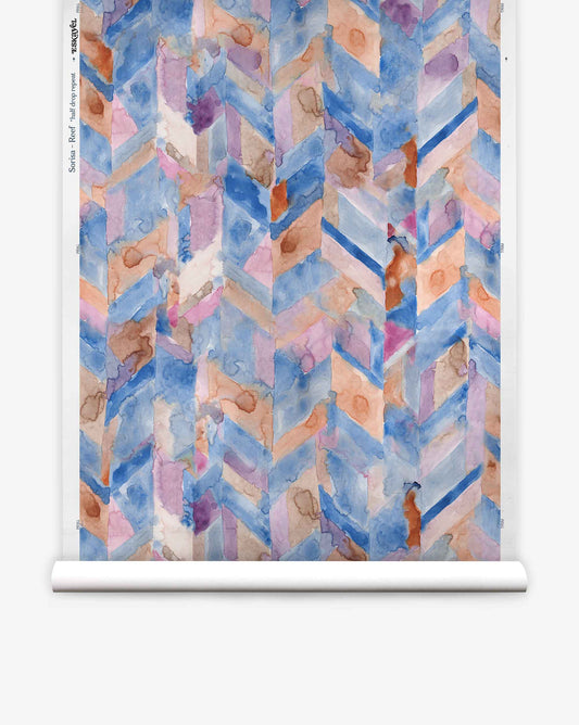 The Sorisa Silk Wallcovering||Reef features a vibrant abstract chevron pattern in blue, purple, pink, and orange watercolor tones.