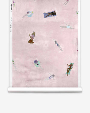 Swim Silk Wallcovering in Shell, a whimsical wallpaper featuring an illustration of people swimming and lounging on pink water.