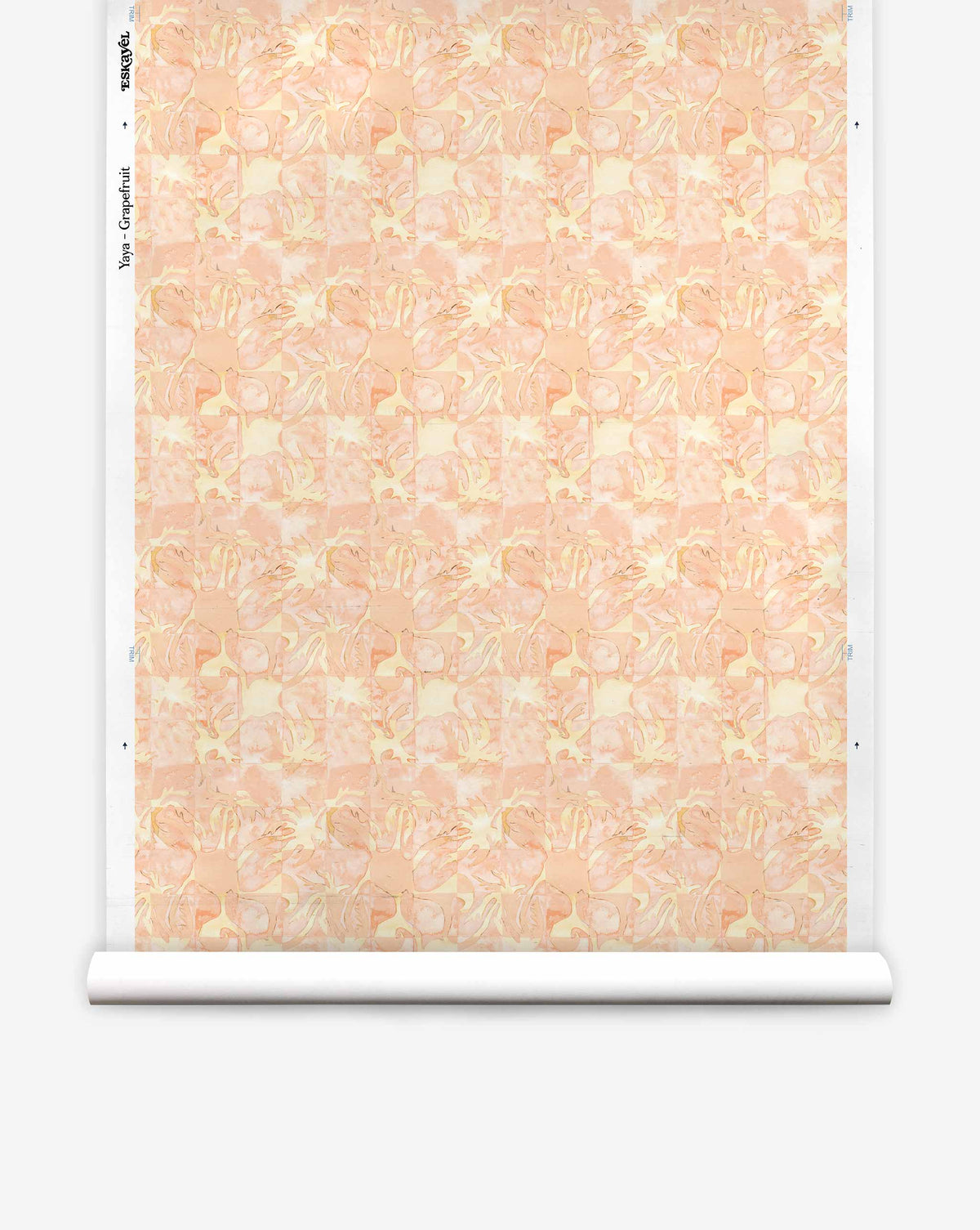 A roll of Yaya Silk Wallcovering in Grapefruit, featuring an abstract, tonal pattern of layered coral and cream shapes.