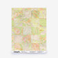 Yaya Silk Wallcovering in Limeade featuring a grid pattern of abstract, watercolor-style leaf shapes in lime green, peach, and cream.