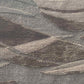 Closeup of Cascade rug in Sable – A hand-knotted custom rug in an abstract flowing pattern using neutral shades of grey and taupe | Eskayel