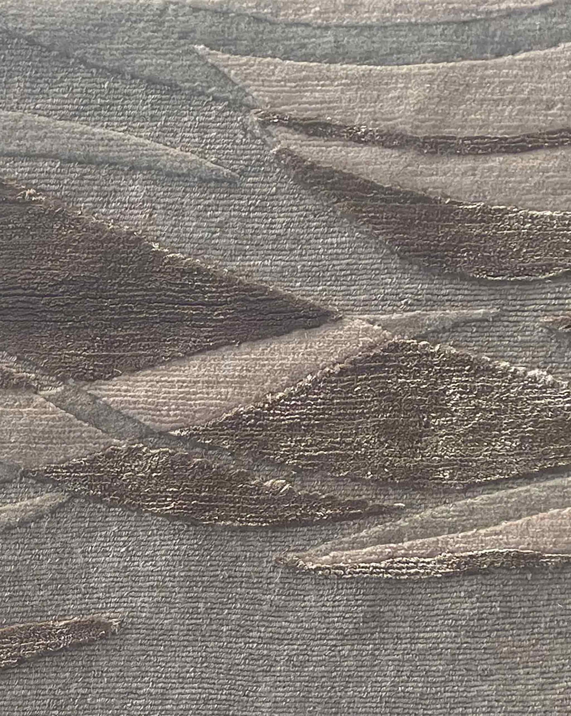 Closeup of Cascade rug in Sable – A hand-knotted custom rug in an abstract flowing pattern using neutral shades of grey and taupe | Eskayel