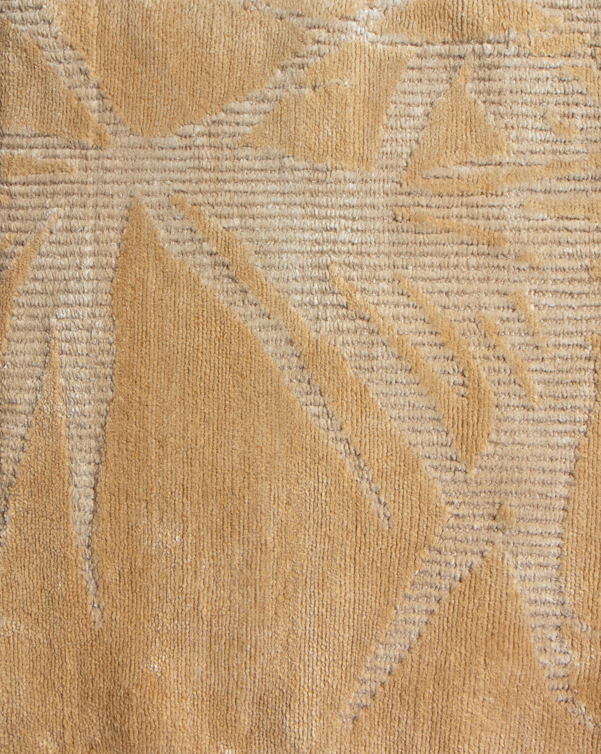 A close up of a Salentu Collection handmade rug with the Domenica Hand Knotted Rug 284' x 95' Gold pattern