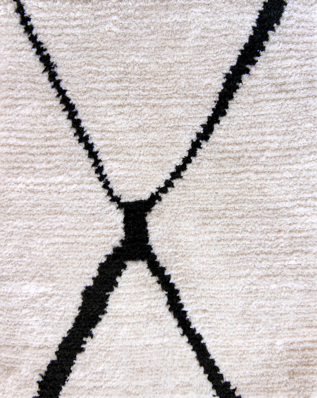 A Large Peaks Hand Knotted Rug Black And White with dynamic black lines in a black and white design