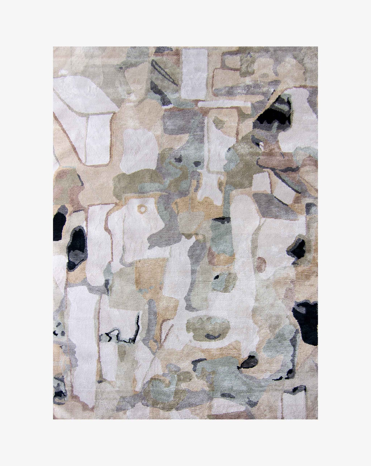 A Medina Hand Knotted Rug Blanca with a lot of different abstract painterly shapes that recall the geometry of Marrakesh roofs in a color pallate of tans, greys, and black | Eskayel