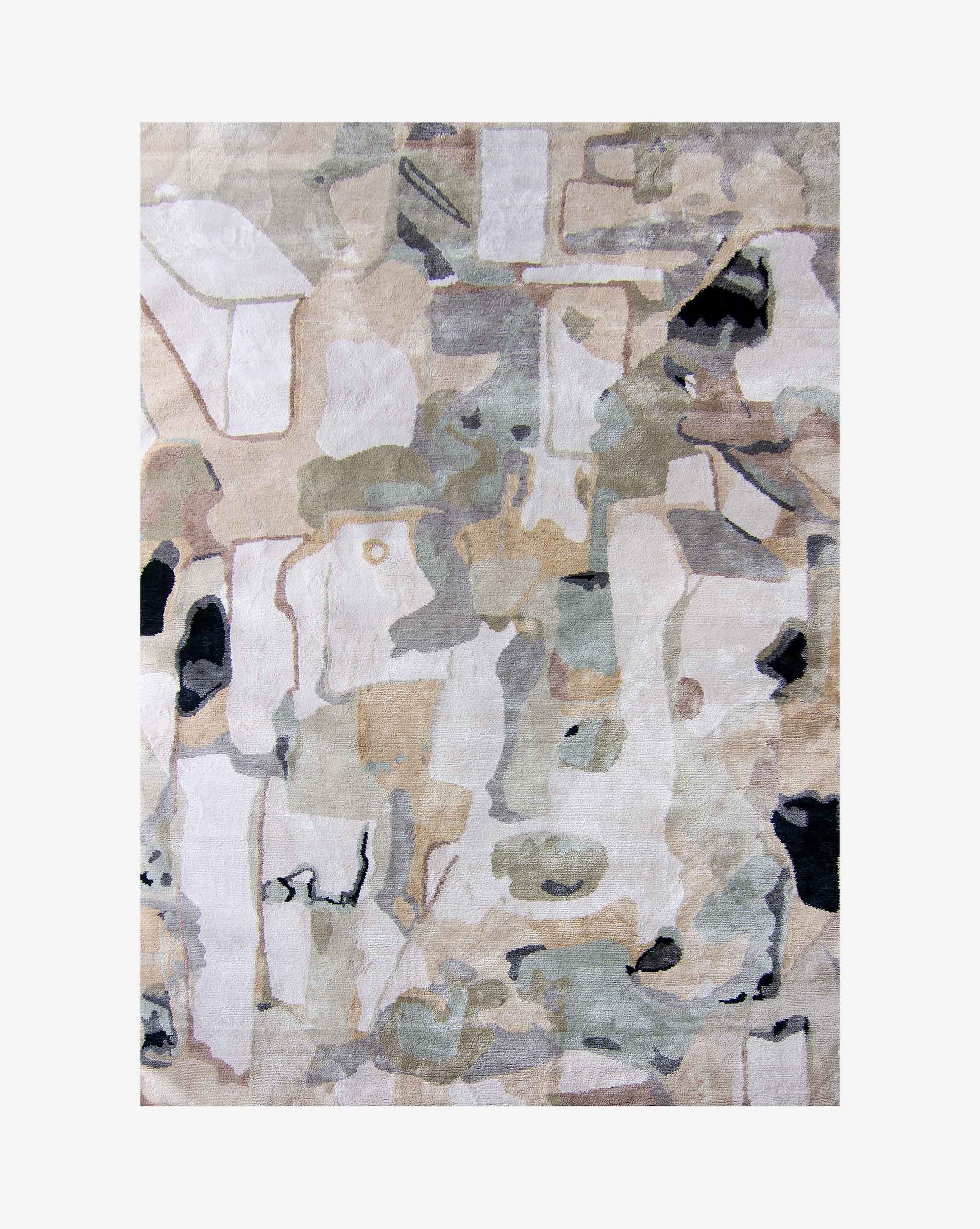 A Medina Hand Knotted Rug Blanca with a lot of different abstract painterly shapes that recall the geometry of Marrakesh roofs in a color pallate of tans, greys, and black | Eskayel