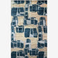 A blue and beige Quotidiana Hand Knotted Rug 5' x 8' Corinth design with abstract designs on it