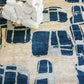 A Quotidiana Hand Knotted Rug 5' x 8' Corinth with a blue and white design on it