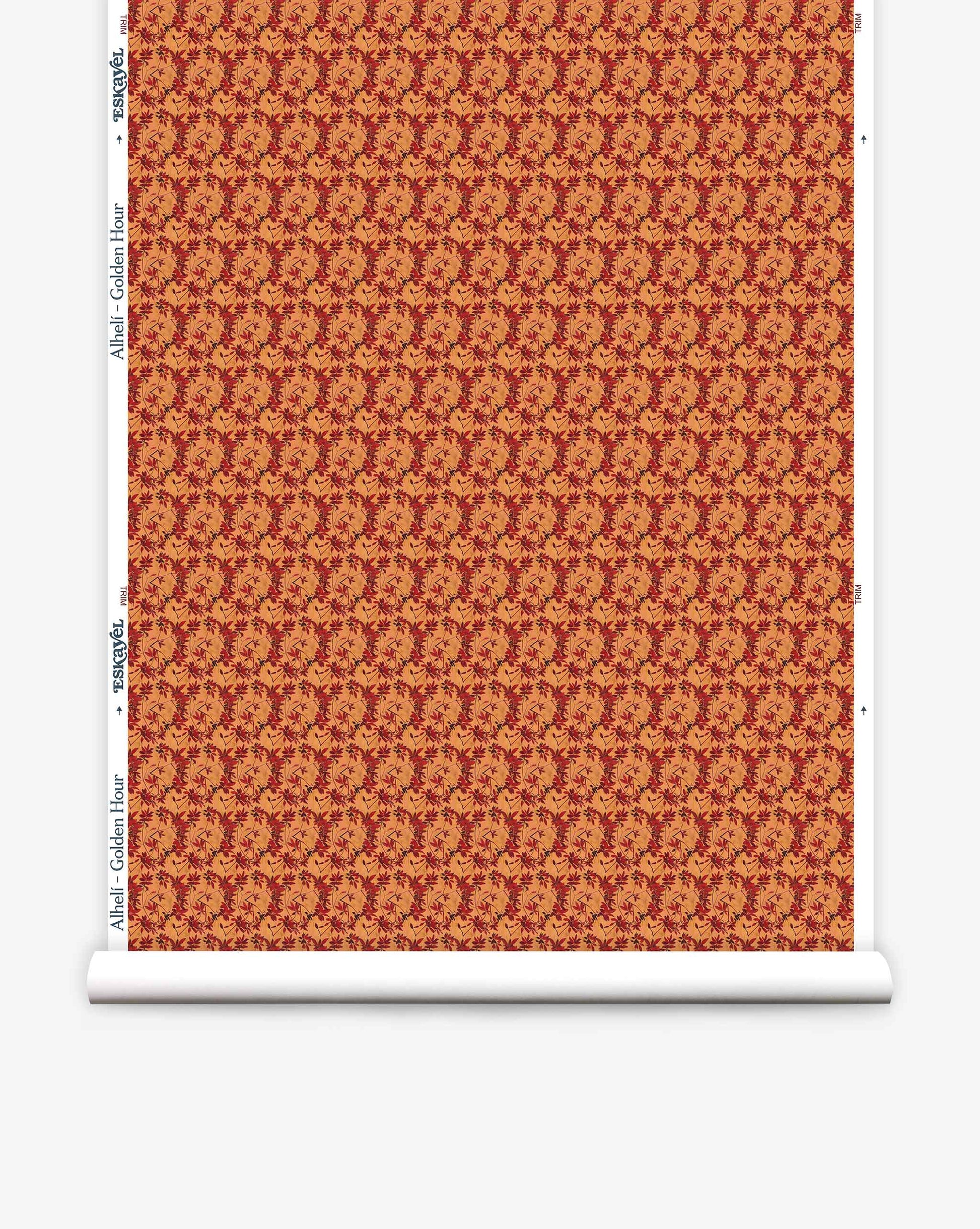 A roll of Eskayel’s Alhelí wallpaper, a tiny repeating pattern inspired by tropical living, in the orange-based colorway Golden Hour.