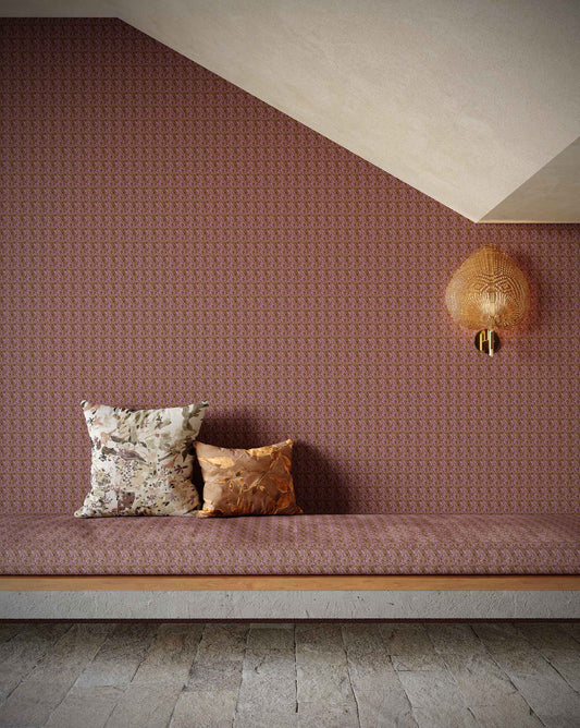 An interior using Eskayel’s Alhelí wallpaper, a tiny repeating pattern inspired by tropical light in the brown-based Rubra colorway.