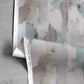 A piece of Arcos Wallpaper Dusk adorned with a watercolor painting embracing tropical climates