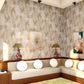 A 3d rendering of a living room with Arcos Wallpaper Sol coated wallpaper
