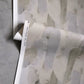 A grey and white pattern on the Arcos Wallpaper Sol collection
