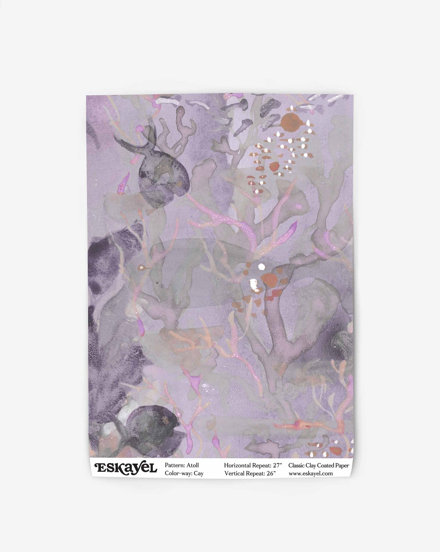 Introducing a sample of Atoll wallpaper with its abstract watercolor design, organic shapes in pastel purple and pink tones in the colorway Cay.