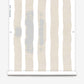 A roll of Bold Stripe Wallpaper in the colorway Sand from Eskayel's Stripes Collection.