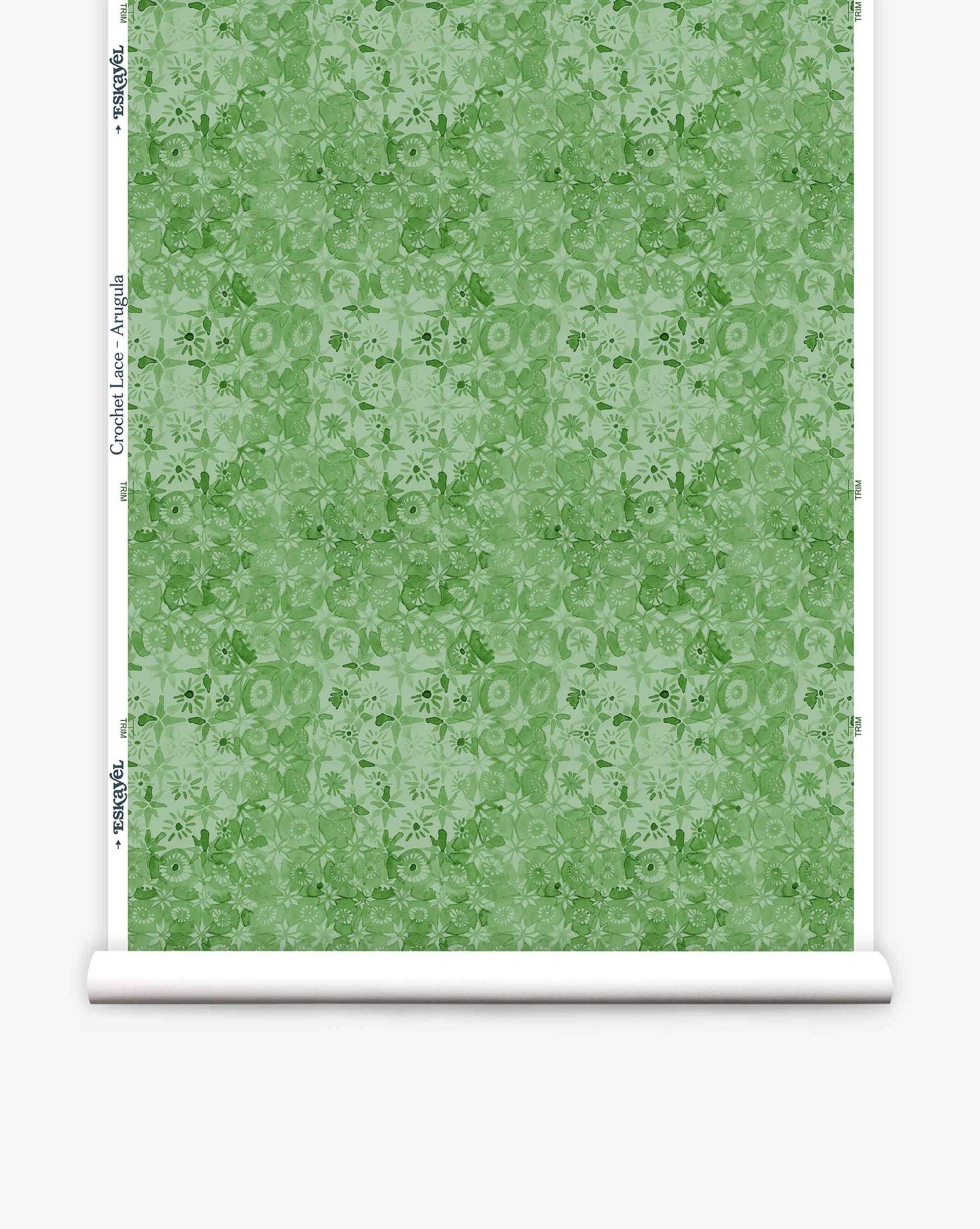 Eskayel’s Crochet Lace wallpaper in Arugula is a micro-print of flowers in a green palette. 
