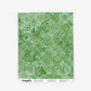 Eskayel’s floral micro printed wallpaper. The Crochet Lace pattern in the green colorway is arugula.