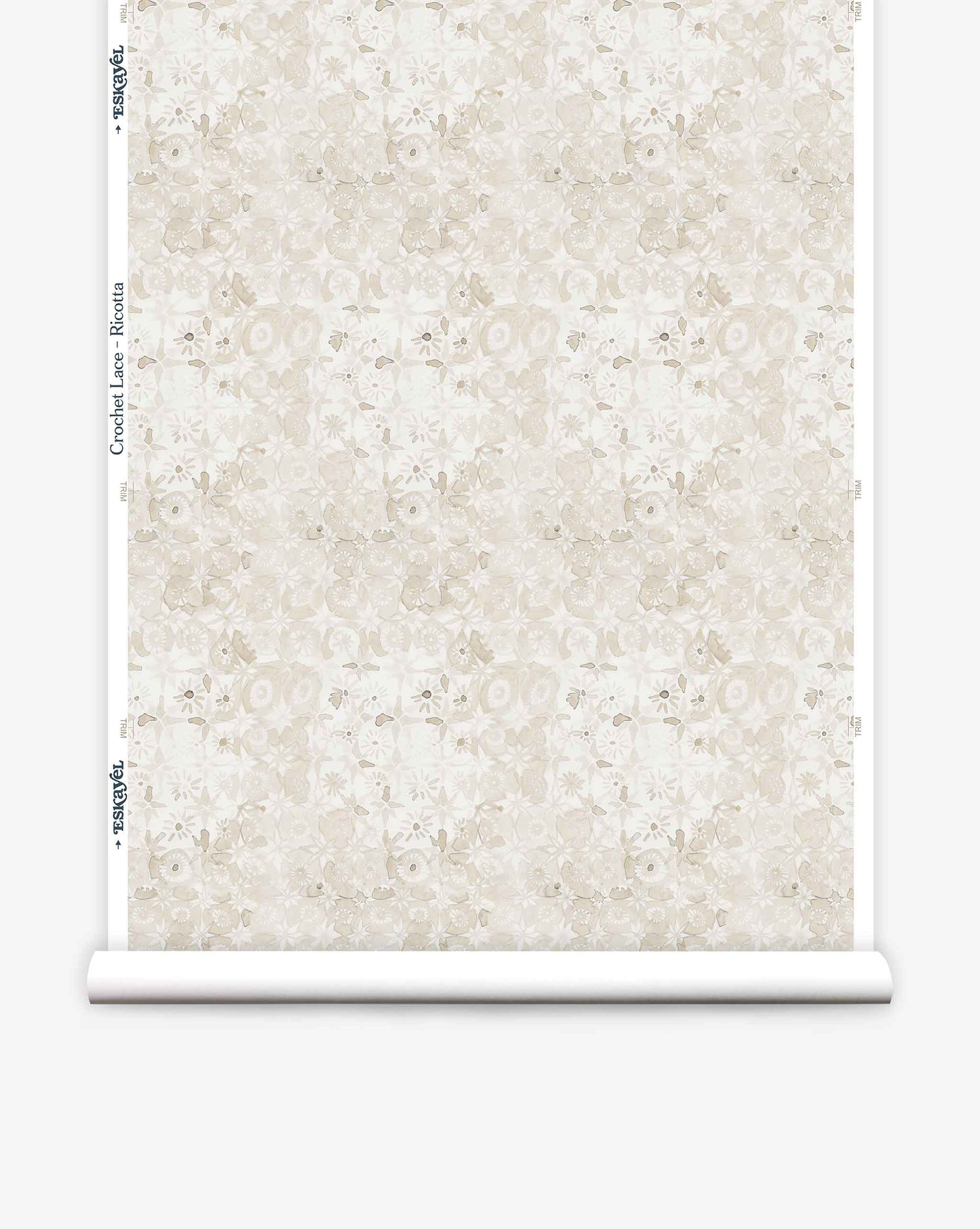 Eskayel’s Crochet Lace wallpaper in Ricotta is a micro-print of flowers in a cream palette. 