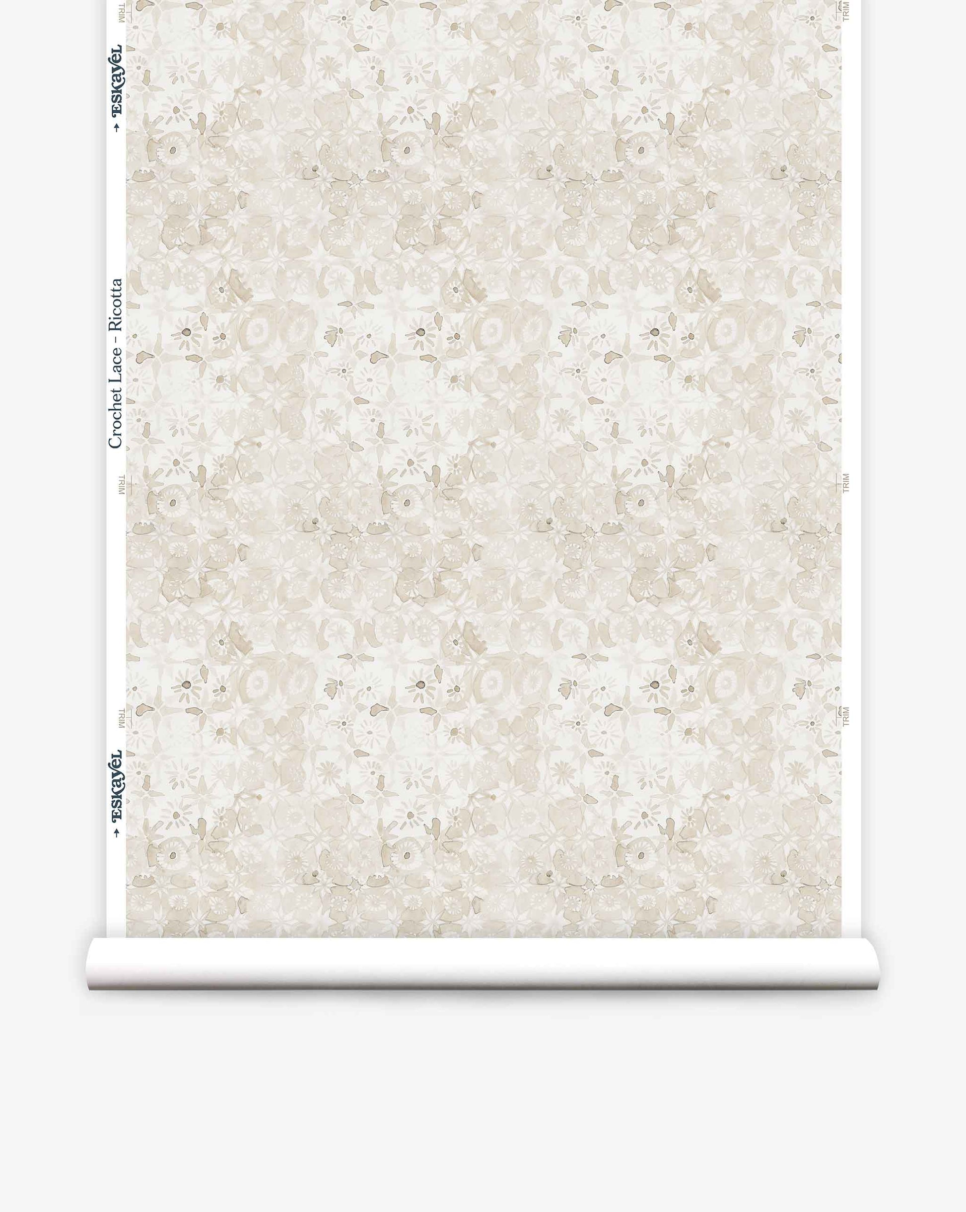 Eskayel’s Crochet Lace wallpaper in Ricotta is a micro-print of flowers in a cream palette. 