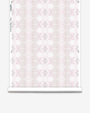 Icelandic Mist Wallpaper roll featuring a pink and white geometric floral pattern displayed against an Icelandic Mist background, viewed rolled out.