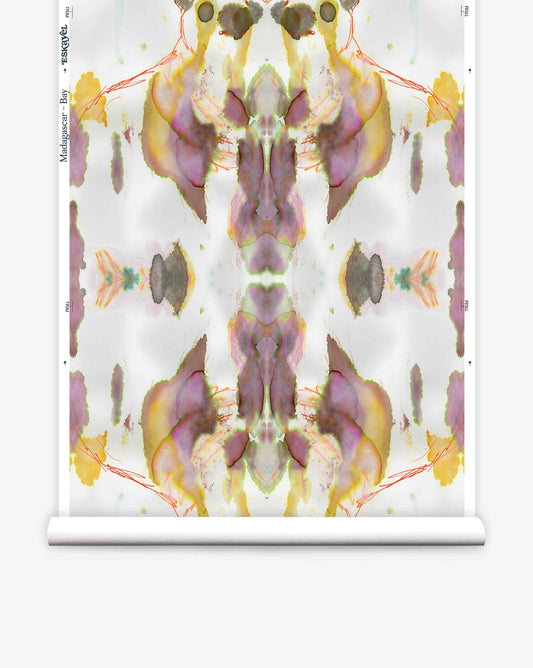 Abstract symmetrical watercolor pattern in pastel colors printed on a roll of luxury Madagascar Wallpaper||Bay, featuring a blend of yellow, green, purple, and orange hues.