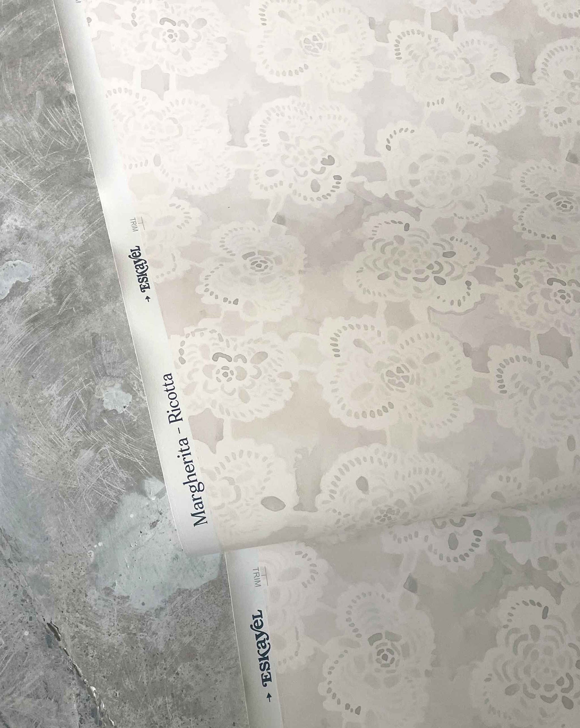 A Neutral floral lace wallpaper in Eskayel's Margherita Ricotta.