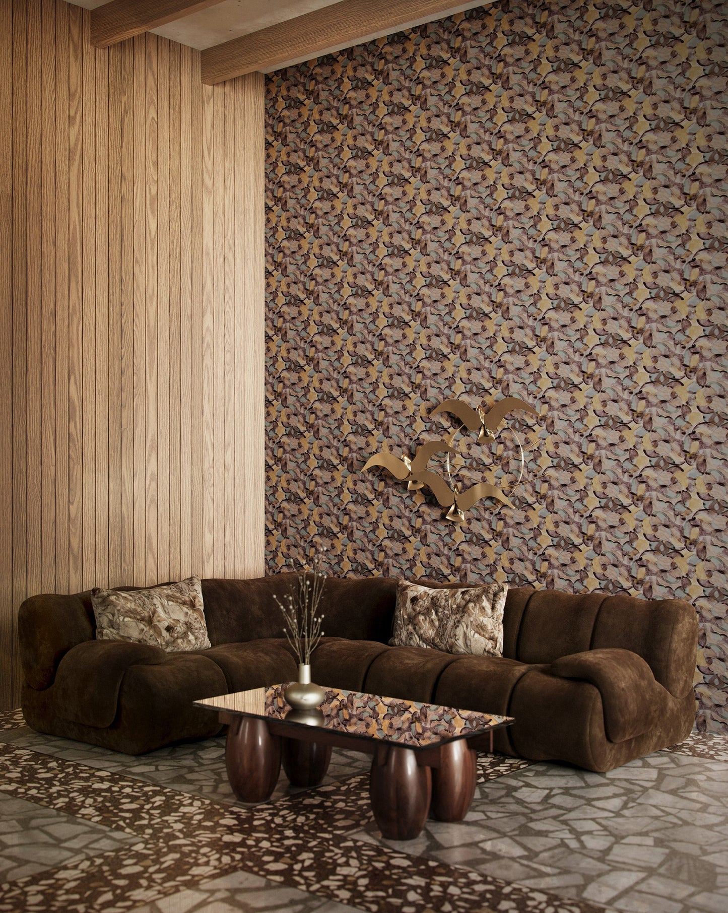 Eskayel's Orbs wallpaper in a dark multi hued colorway is displayed in a living room.
