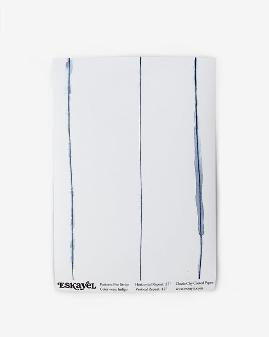 A white Pen Stripe Wallpaper Sample Indigo with blue and white lines on it