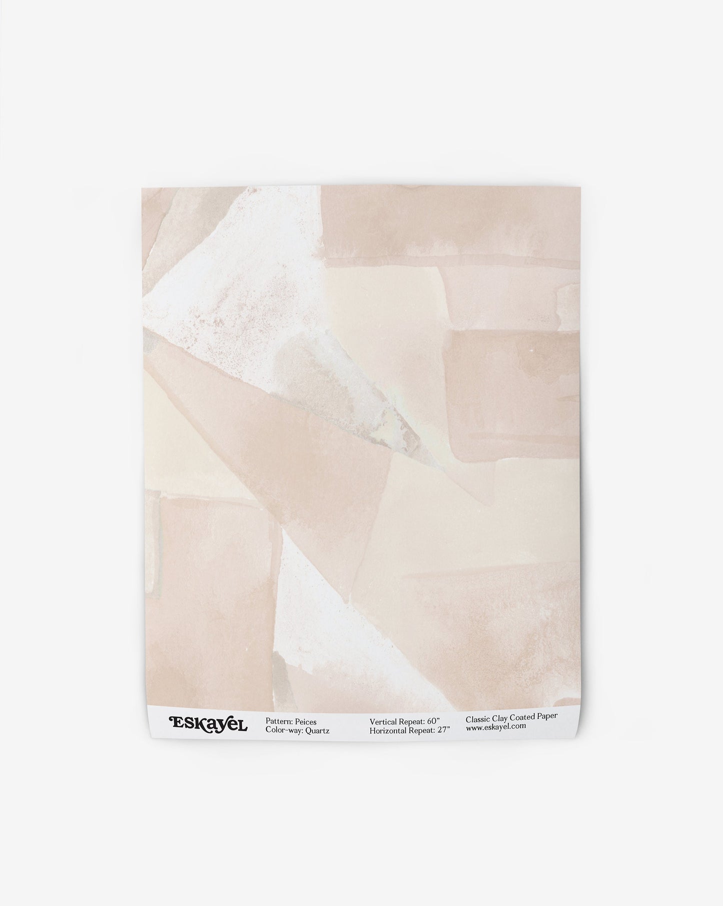 Our Pieces Wallpaper in Quartz has a color blocked design  of puzzle pieces in shades of pink.