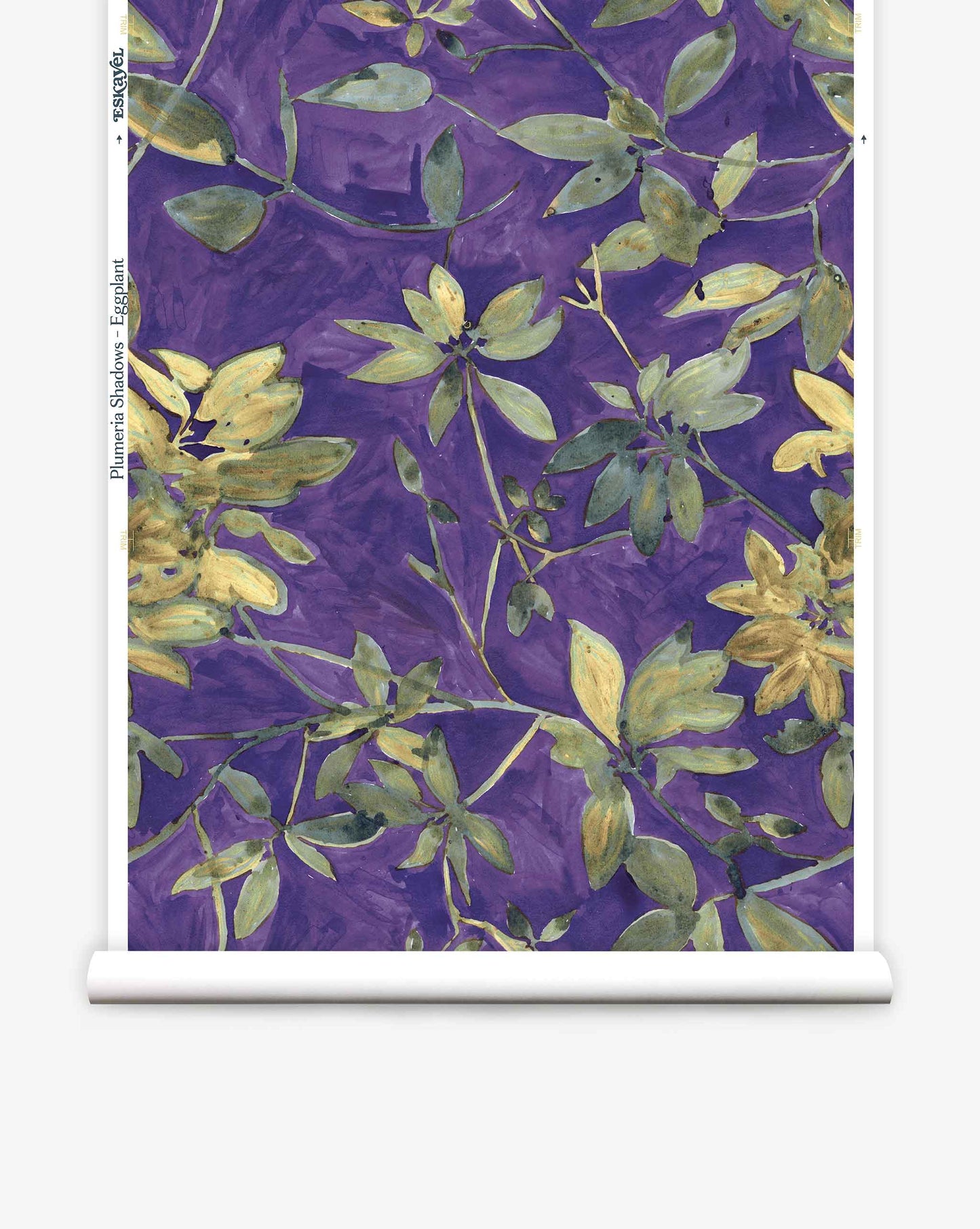 A roll of Eskayel’s Plumeria Shadows wallpaper pattern in Eggplant, a colorway of purple with green tones.