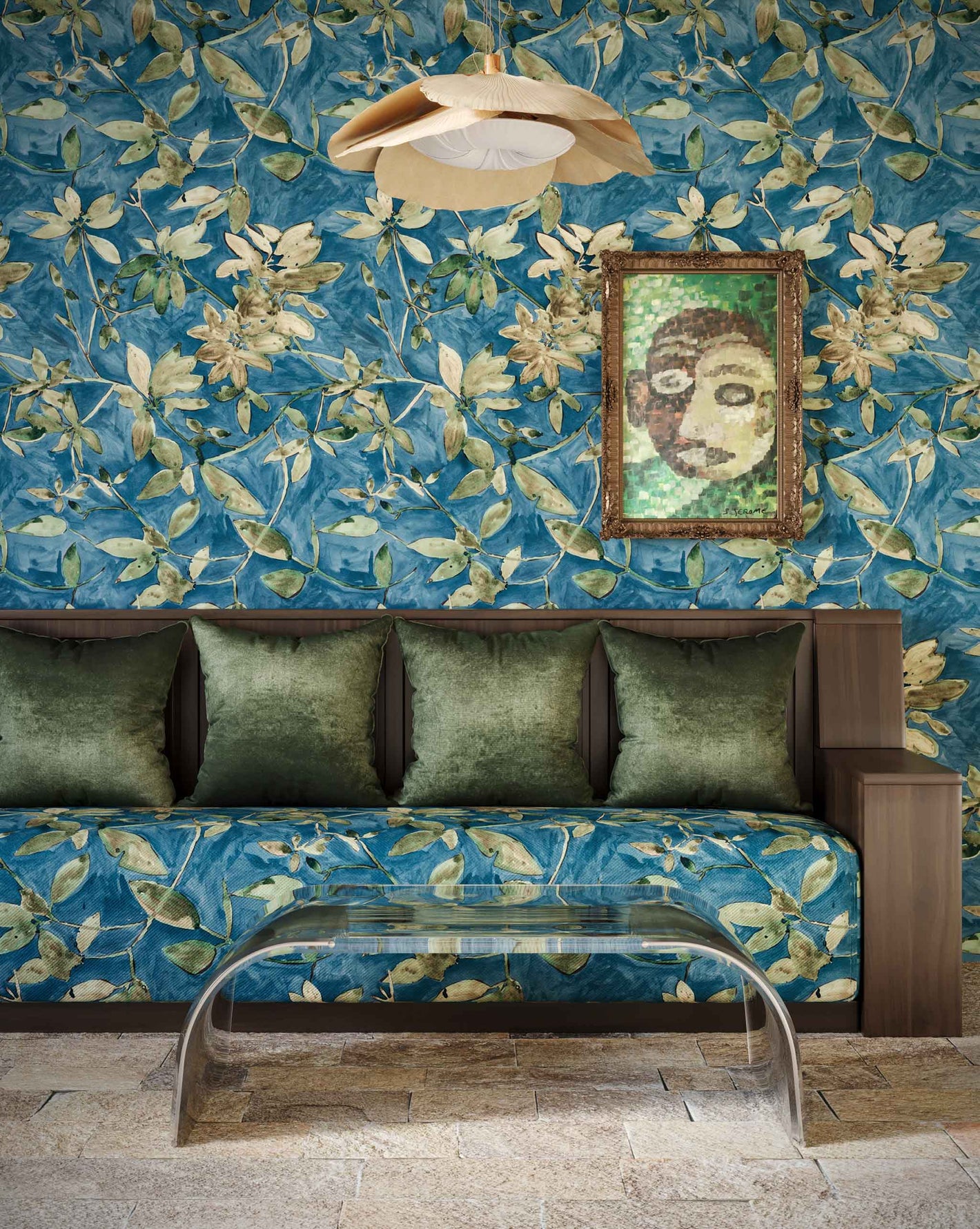 Plumeria Shadows Wallpaper Tide Pool — hand-painted tropical branches and leaves casting sharp shadows onto a stone patio in the midday sun form the basis of this pattern. Installed in a living room in Tide Pool, a color way featuring a deep blue background with green leave | Eskayel