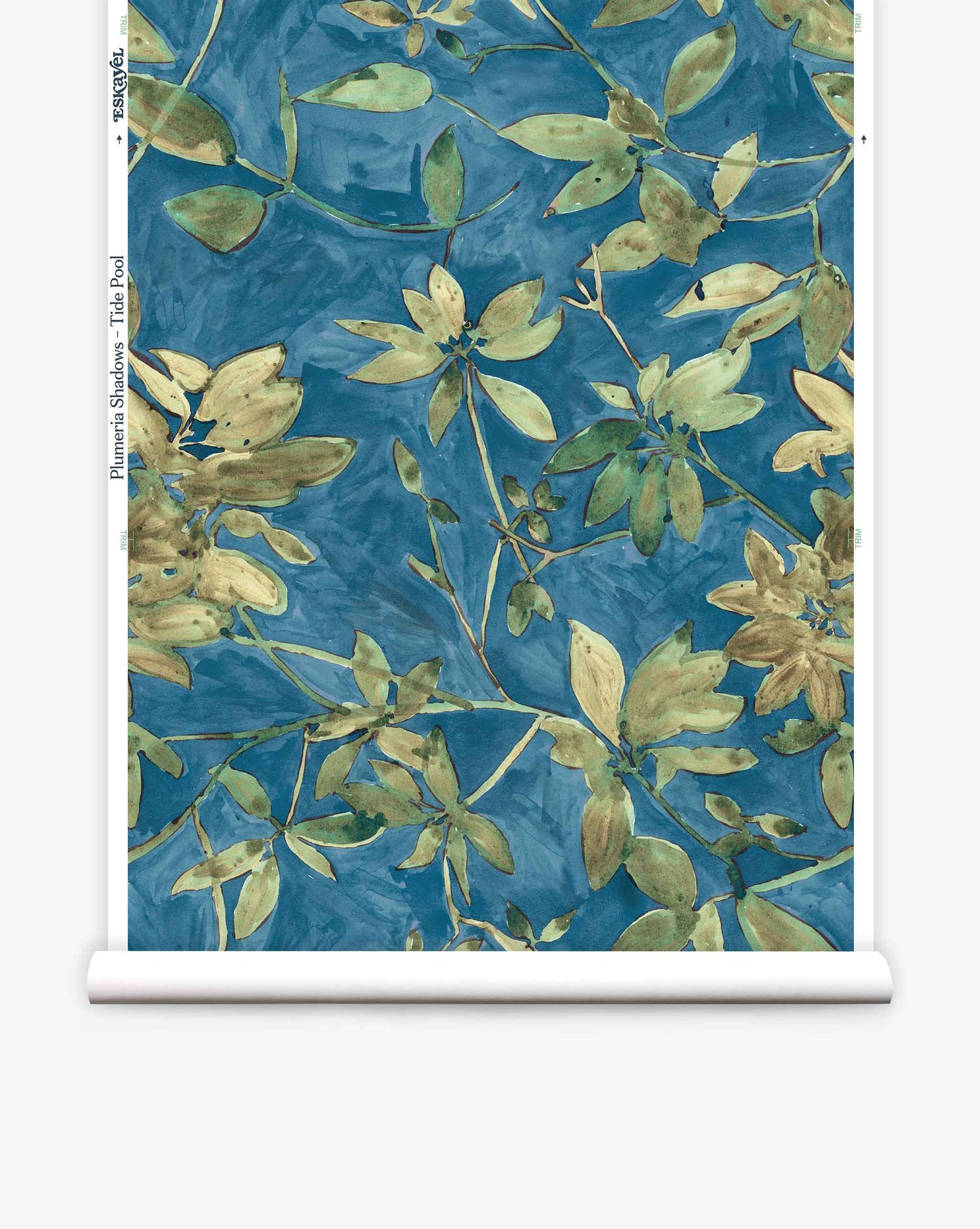 A roll of Eskayel’s Plumeria Shadows wallpaper pattern in Tide Pool, a colorway featuring a deep blue background.