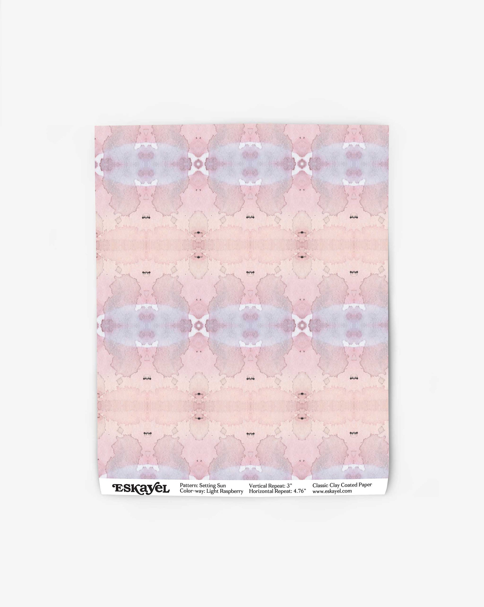 A sheet of light raspberry, abstract-patterned paper with the brand name "Setting Sun Wallpaper||Light Raspberry" and product details printed at the bottom.