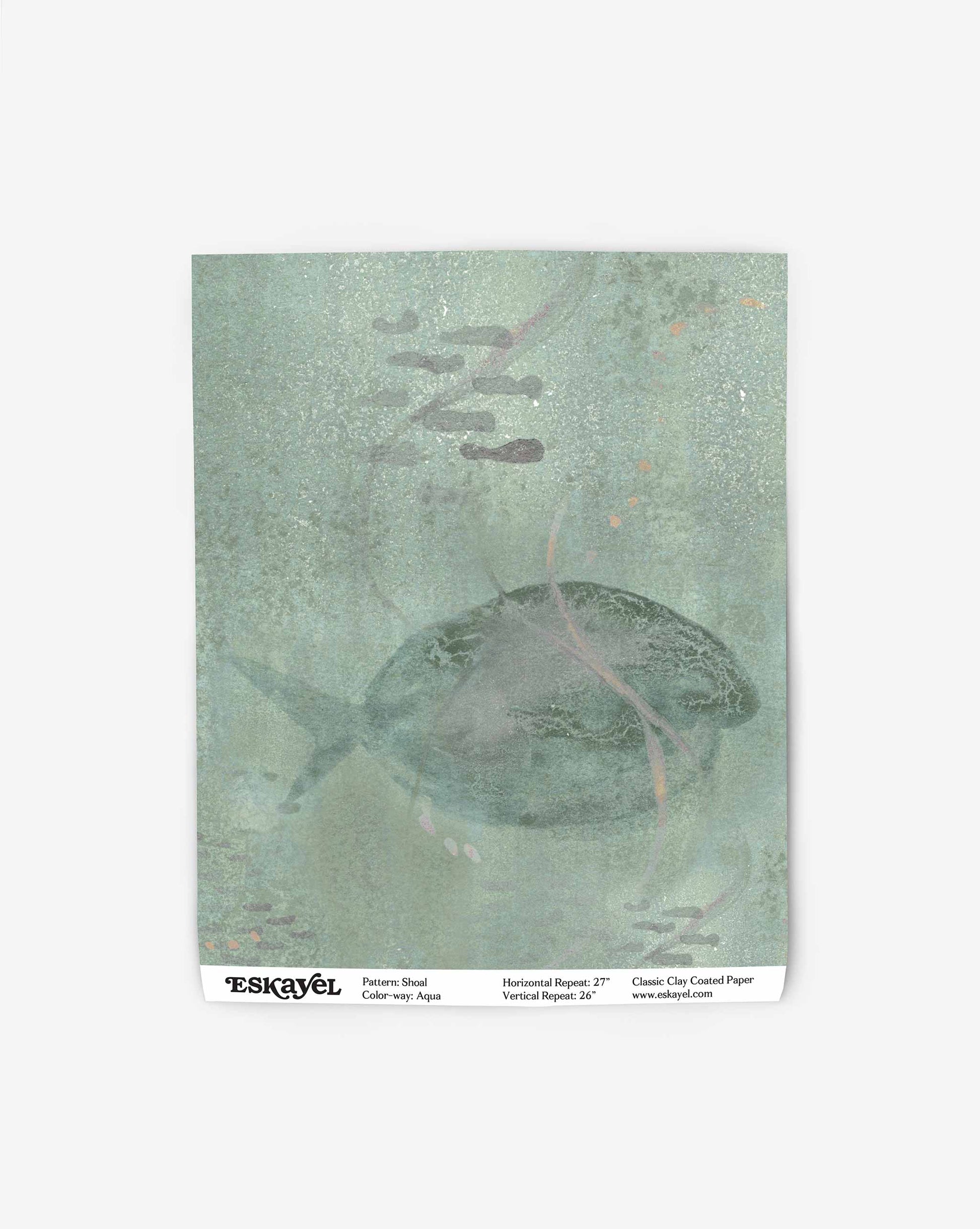 A tranquil abstract piece, the Shoal Wallpaper swatch in Aqua displays a green hue with a fish design. Its subdued aqua tones and gentle patterns hint at a tropical design.