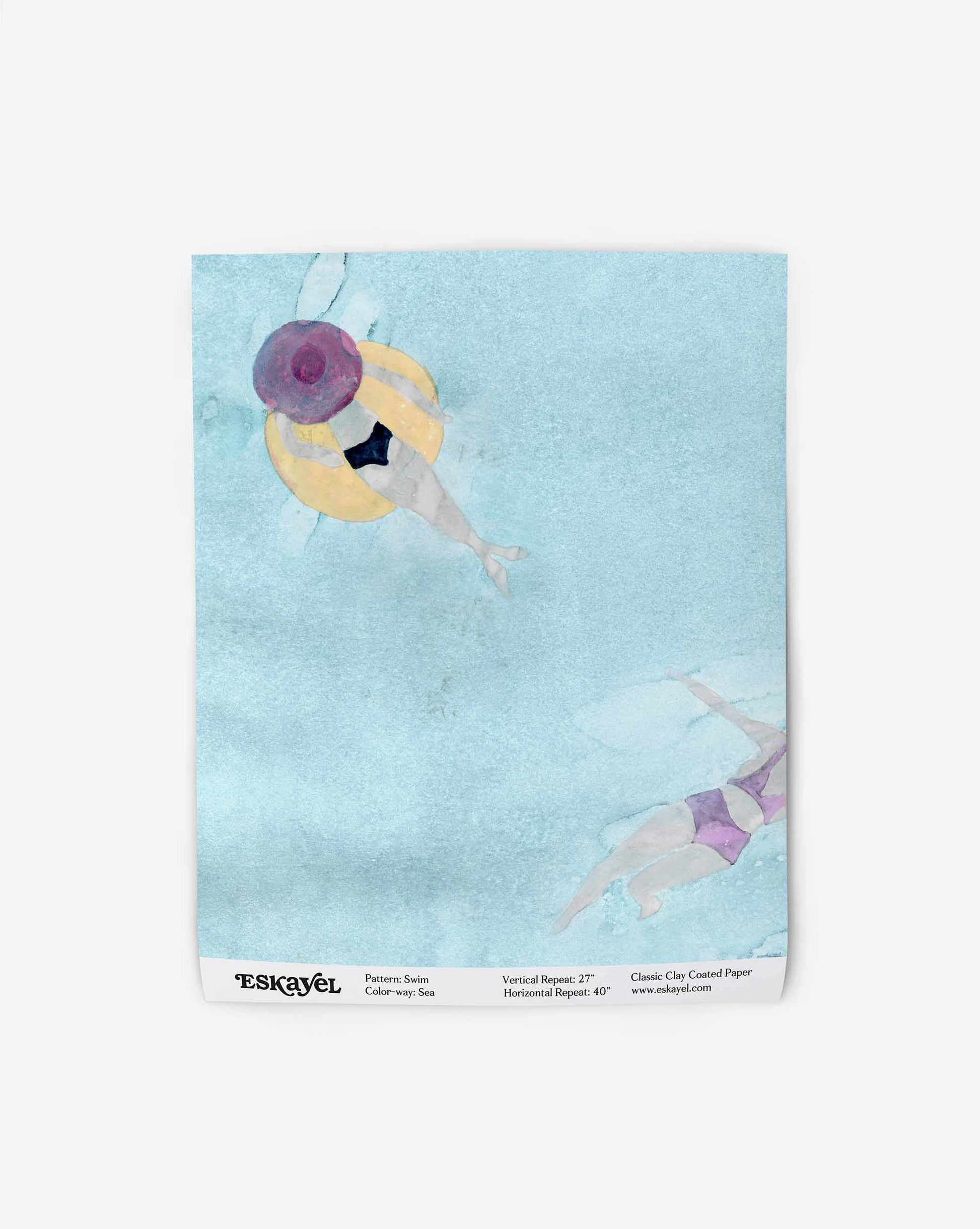 A watercolor painting depicts two figures floating in a pool. One is on a yellow float wearing a purple hat; the other is swimming. The text below reads "Eskayel" with additional details about the painting. Order a Swim Wallpaper Sample||Sea to appreciate its intricate beauty up close.