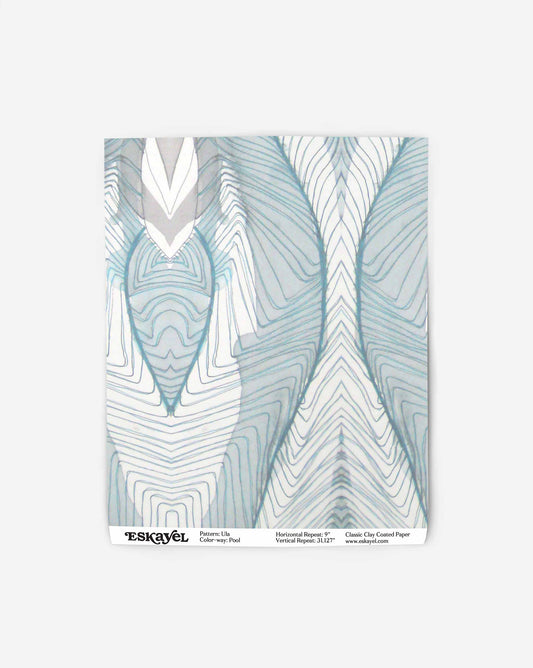 A blue and white wallpaper swatch with an abstract design