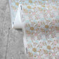 Yaya wallpaper in Brisa in close up — beach-themed graphic botanical wallpaper in turquoise, taupe, and light pink | Eskayel