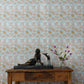Yaya wallpaper in Brisa installed in a room — beach-themed graphic botanical wallpaper in turquoise, taupe, and light pink | Eskayel