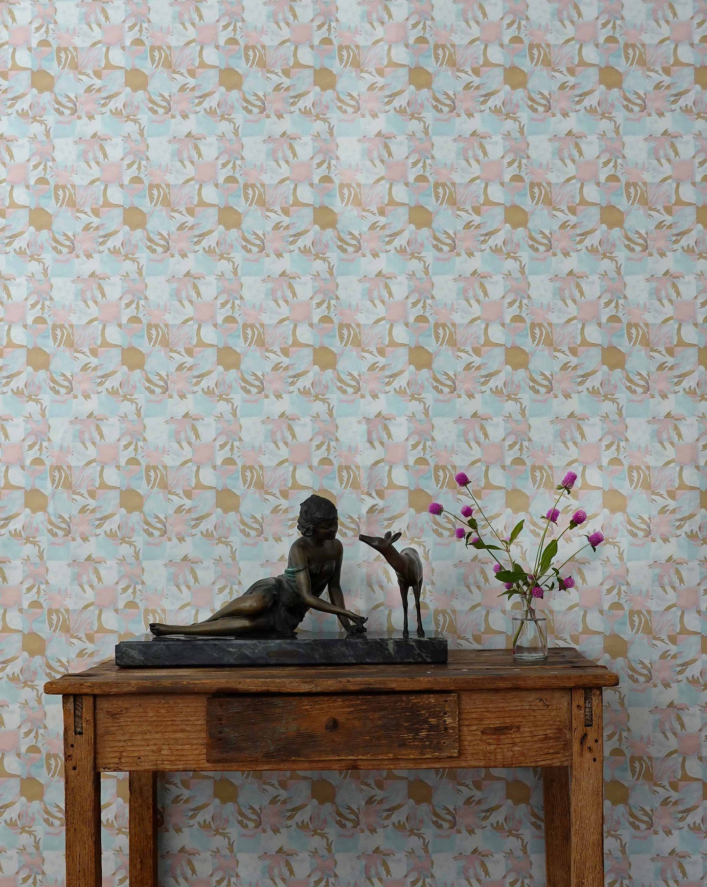 Yaya wallpaper in Brisa installed in a room — beach-themed graphic botanical wallpaper in turquoise, taupe, and light pink | Eskayel