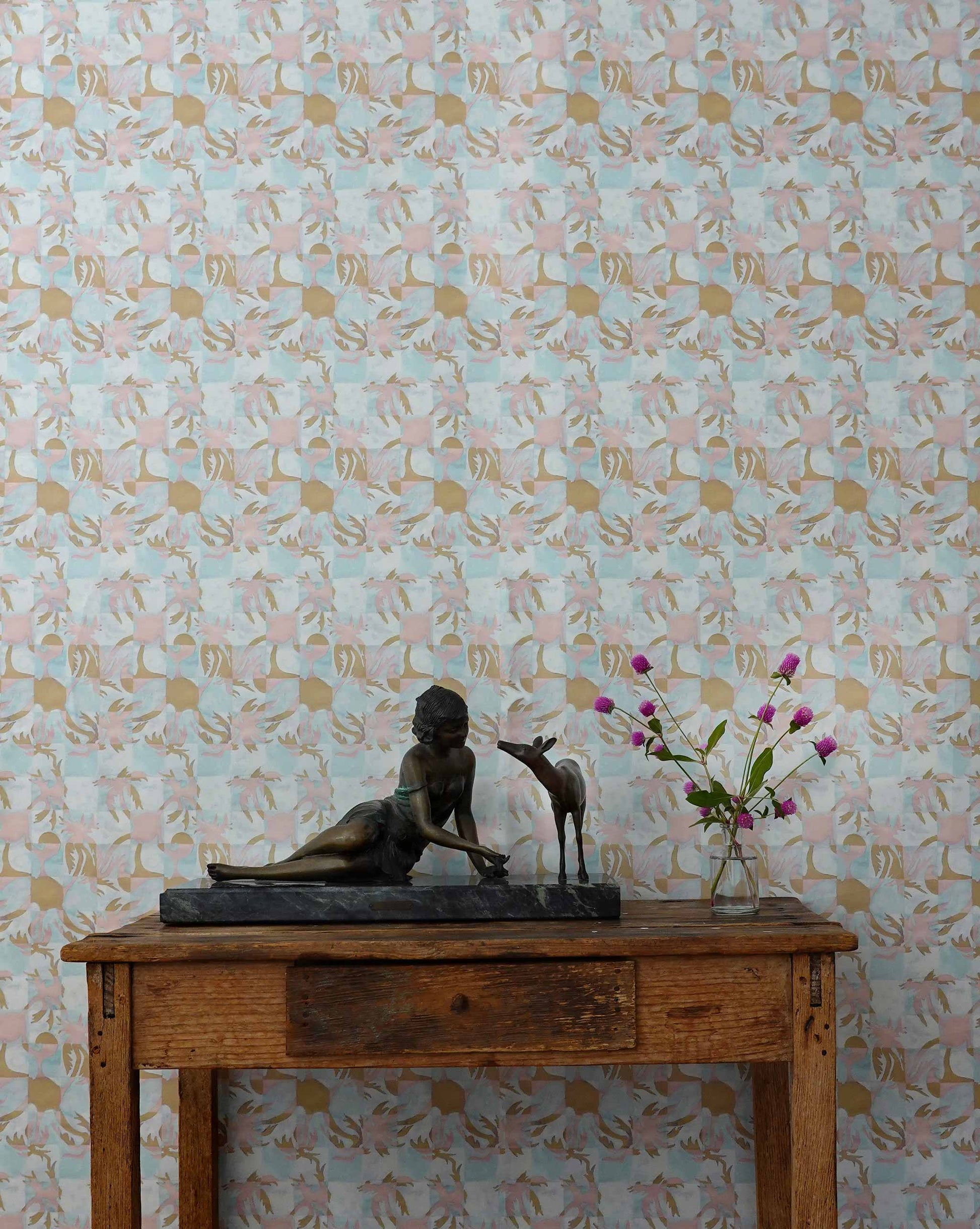 Yaya wallpaper in Brisa installed in a room — beach-themed graphic botanical wallpaper in turquoise, taupe, and light pink | Eskayel