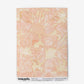 Yaya wallpaper in Grapefruit as a swatch — beach-themed graphic botanical wallpaper in pale peach with highlights of light yellow | Eskayel