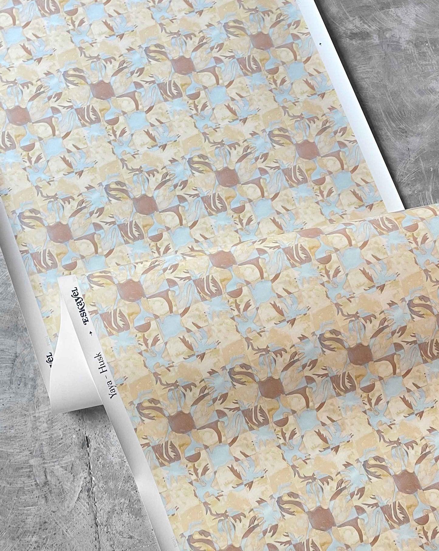 Yaya wallpaper in Husk in close up — beach-themed graphic botanical wallpaper in creamy yellow, earthy brown, and light blue | Eskayel