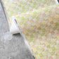 Yaya wallpaper in Limeade in close up — beach-themed graphic botanical wallpaper in bright yellow, lime green, and peach | Eskayel