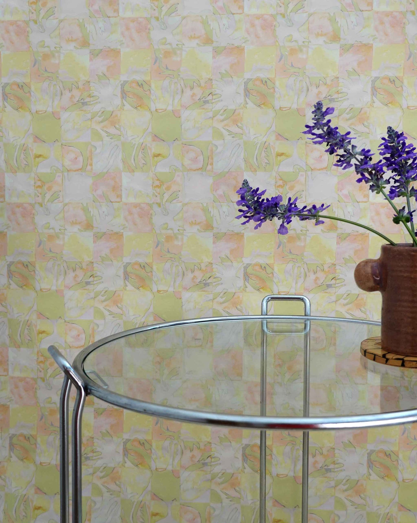 Yaya wallpaper in Limeade installed in a room — beach-themed graphic botanical wallpaper in bright yellow, lime green, and peach | Eskayel
