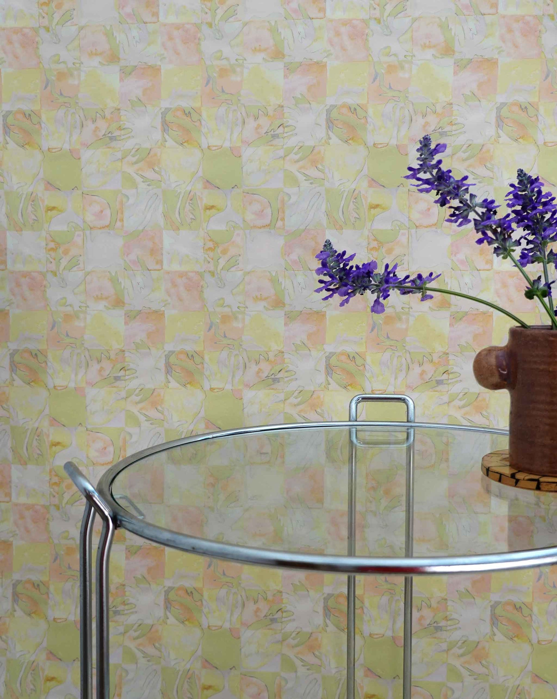 Yaya wallpaper in Limeade installed in a room — beach-themed graphic botanical wallpaper in bright yellow, lime green, and peach | Eskayel