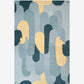 Eskayel's Arcos rug in the colorway sage is an abstract piece with geometric shapes in blue, yellow, and green.