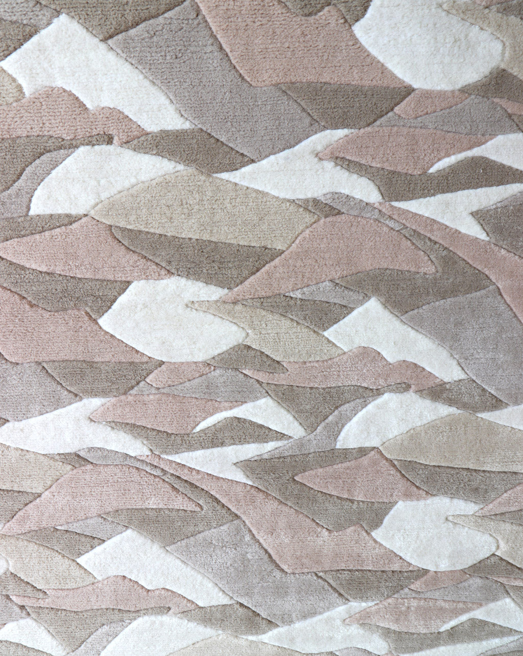 A Mani Hand Knotted Rug 5' x 8' with a pattern of mountains on it, made of merino wool.