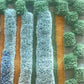 Pyrus Stripe Rug in Low Tide closeup – hand-knotted studio-designed rug in green and blue | Eskayel