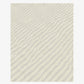 Made of soft merino wool, Eskayel’s Sand Lines rug in Sand is a colorway of beige and grey.